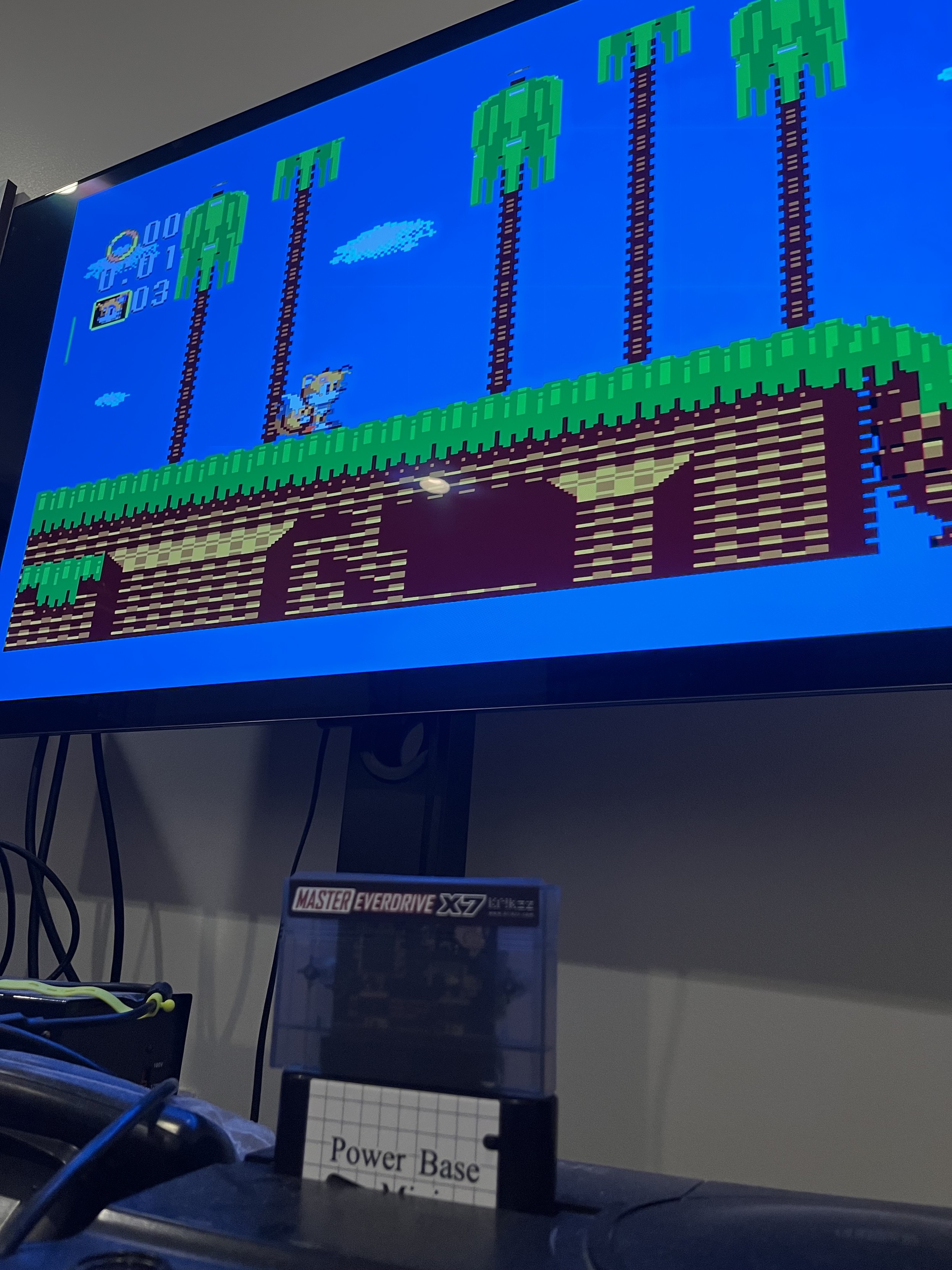 Photo of a JVC X’eye with a Master Everdrive through an adapter playing Sonic Triple Trouble on a PC