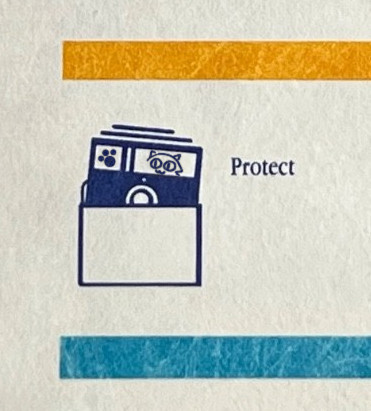 its the back of a floppy disk sleeve for a 5.25 diskette, zoomed on one of the 'warnings/care' icons, showing you should place the diskette into its sleeve with the word "protect" next to it. but the disk has a catte face =^^= and a paw label. its all monochrome blue silkscreen. and above/below are gold/cyan bars. the paper is very fibery like tyvek.